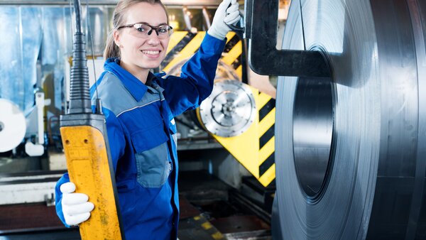 Female Employee handles Material